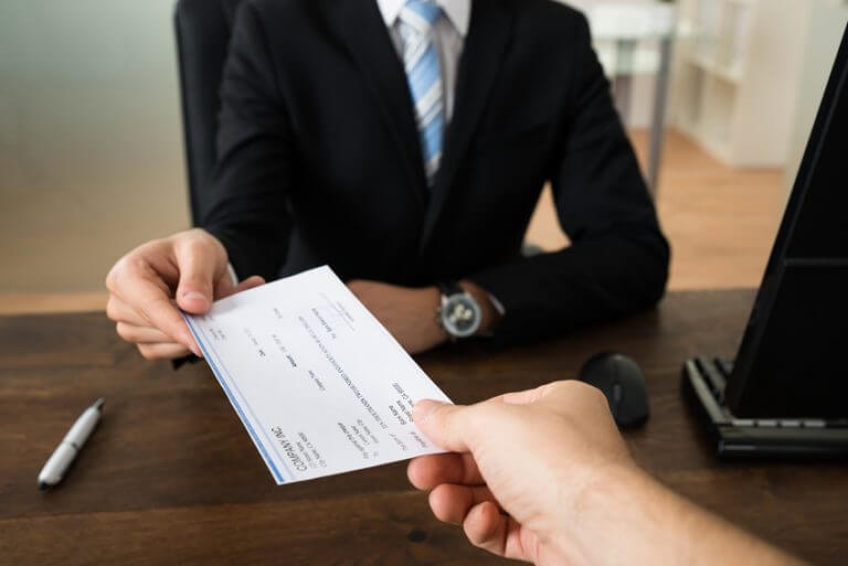 Stock photo of a giving a check