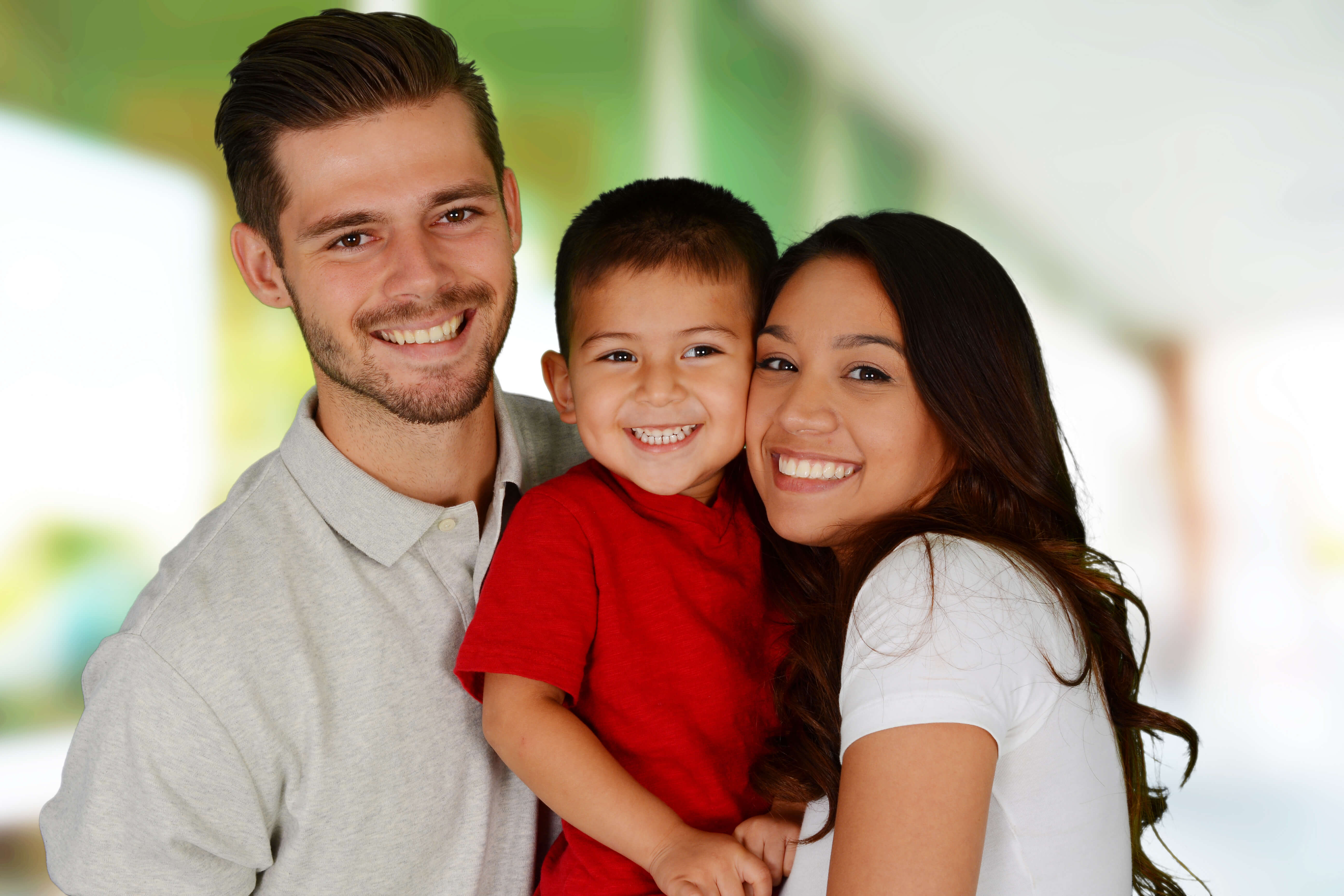 Stock photo family celebrating home purchase mortgage